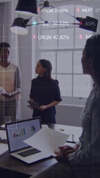 Animation of statistical, stock market data processing over four diverse women discussing at office