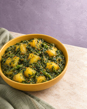 Indian Saag Aloo Spinach and Potato Curry with Aromatic Spices