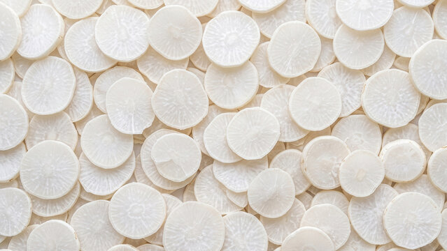 Pile of dried white yam slices, scattered full frame texture in pure milky white