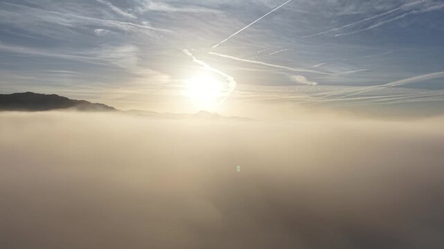 hills and mist at low level sun in Switzerland. Shot on DJI Mavic Air 3s 4K 60fps 150mbit.