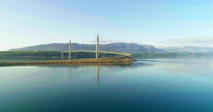 Wide Drone Approach Toward Helgeland Bridge over Calm Leirfjorden, Norway