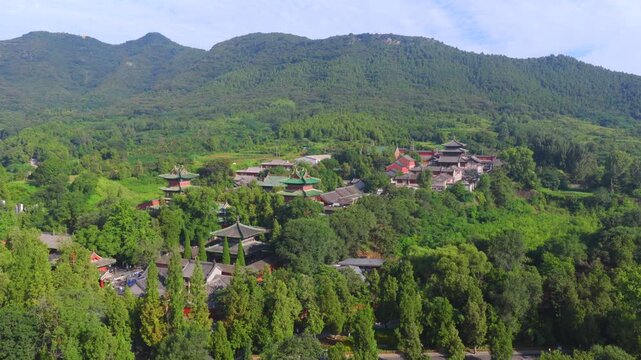 Aerial view of Shaolin Temple in morning mist, world cultural heritage in Henan China, birthplace of Zen Buddhism and Shaolin Kung Fu。Chinese civilization，Chinese philosophy