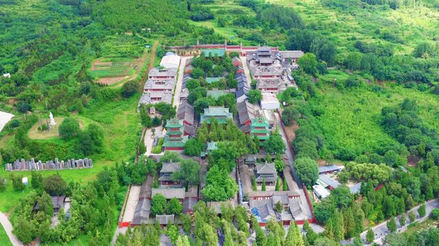 Aerial view of Shaolin Temple in morning mist, world cultural heritage in Henan China, birthplace of Zen Buddhism and Shaolin Kung Fu