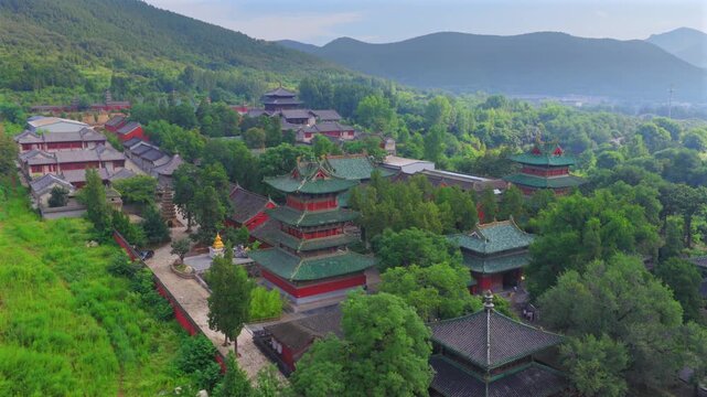 Morning fog over Shaolin Temple complex, historic Chinese Zen Buddhist temple and origin place of Shaolin martial arts。Chinese civilization，Chinese philosophy，Chinese history