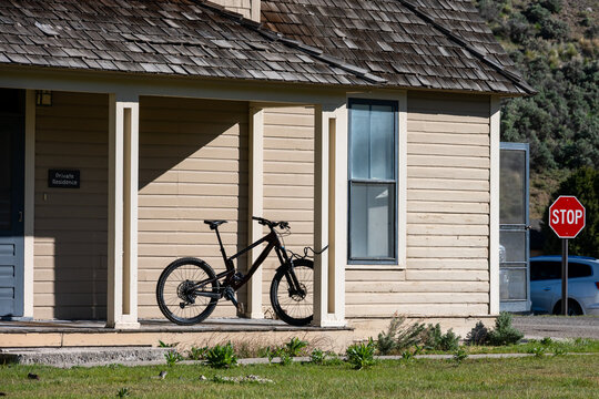 Park employee housing with bicycle on deck for work commute, park administrative headquarters at Mammoth Hot Springs, summer vacation exploring Yellowstone National Park
