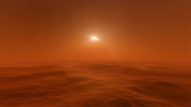 A bright sun shines through a thick hazy orange atmosphere above a desolate landscape.