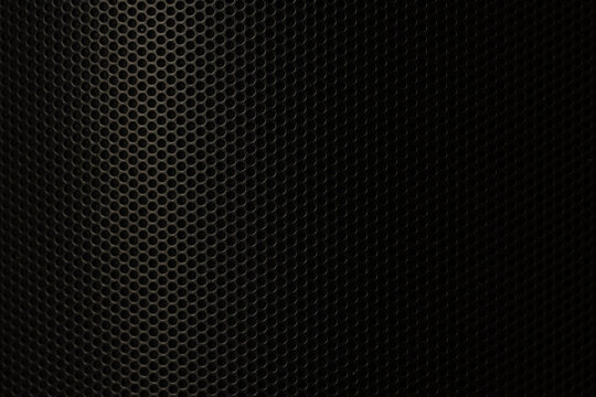 Black metallic speaker grill texture background, close-up perforated metal mesh pattern for audio equipment, technology, and modern design,Macro