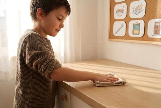 Young Child Putting Away Shoes Using Visual Routine