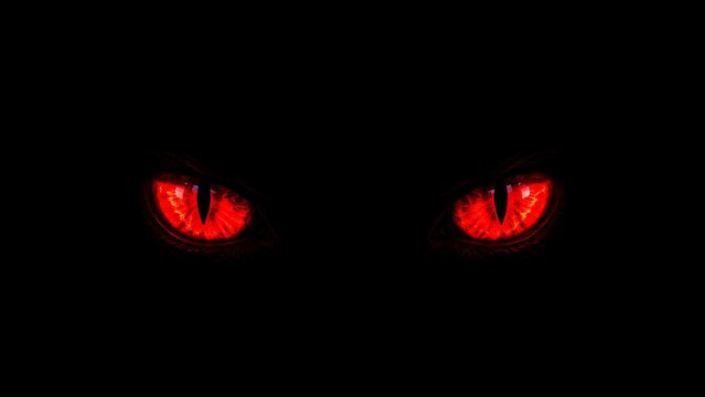 Glowing intense red eyes piercing through thick darkness in mysterious atmosphere