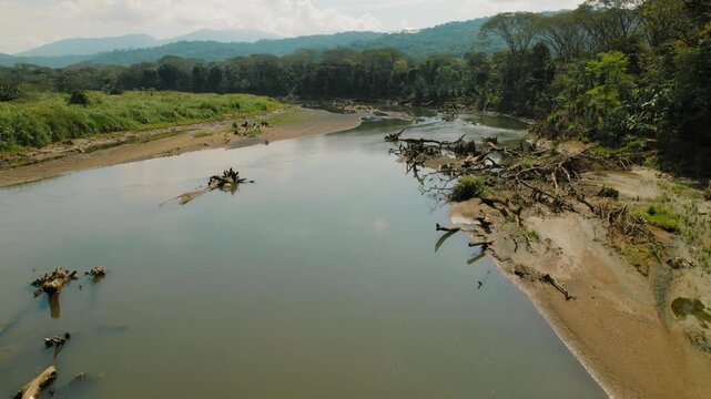 River Tarcoles flows through tropical rainforest forest in Costa Rica