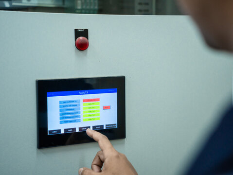 Close up engineer check analysis continuous emissions monitoring system for air pollution reduction, electrical control panel. Sustainable environment technology data information Concept energy saving