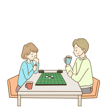 オセロのボードゲームを楽しむ男女