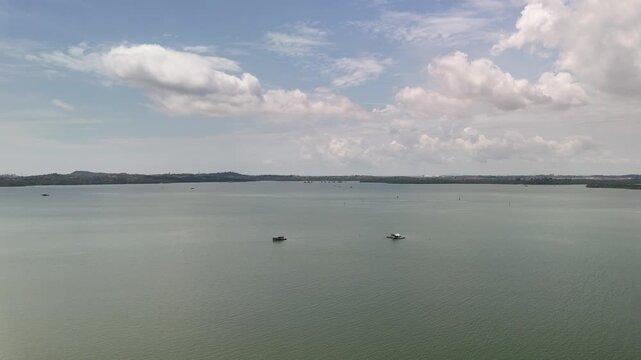 Small Boats Floating on Calm Sea in Batam, Indonesia - 4K Drone Footage