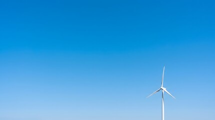 Fototapeta premium Wind Turbine Against Clear Sky for Renewable Energy