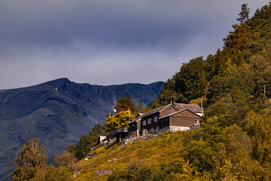 A beautiful traditional mountain farm buildings high on the mountain at the Geiranger village. A summer scenery of World Heritage area in Western Norway.