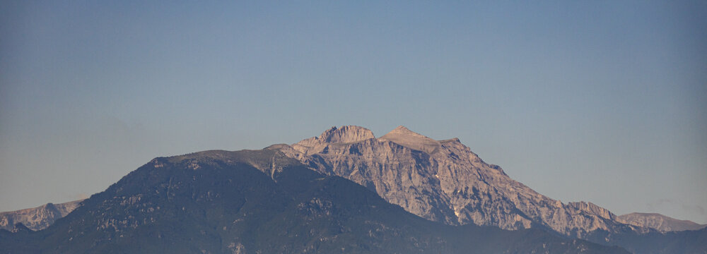 Majestic rocky peaks of Mount Olympus under clear sky