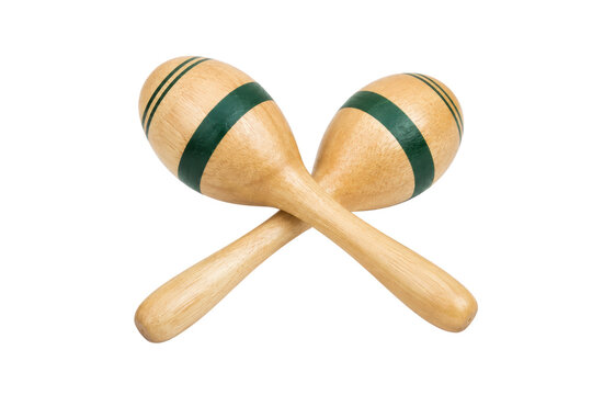 Pair of crossed wooden maracas with natural wood grain and dark green decorative bands, isolated on a clean white background. Traditional handheld percussion instruments used for rhythm, music, dance,