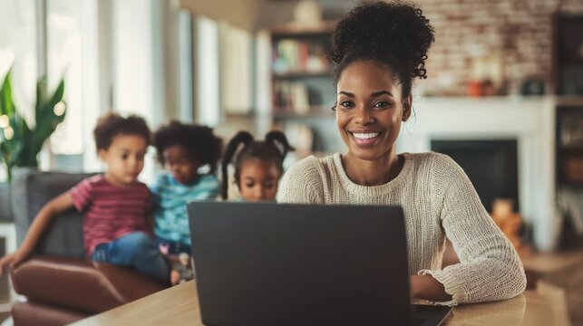 A parent working from home with kids in the background.
