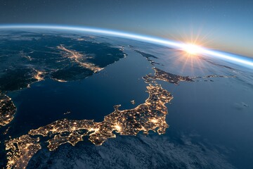 Fototapeta premium 広大な宇宙空間から日本列島の美しい夜景に光が差し込む日の出