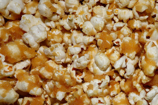 Close up texture background of homemade caramel popcorn with sugar coating