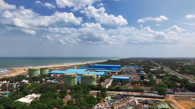 Seawater desalination plant on the coast beneath a blue sky