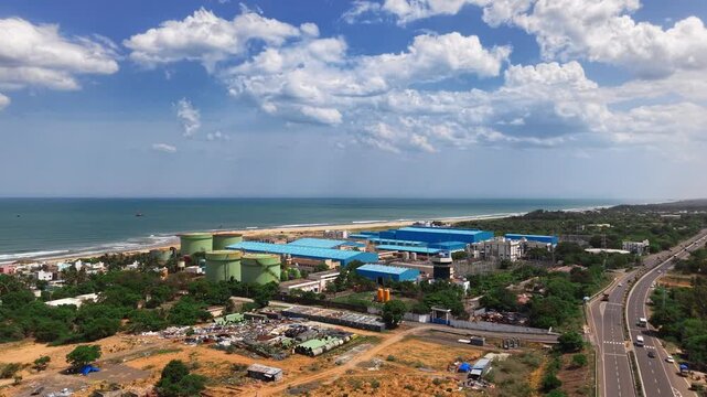 Coastal seawater desalination plant beside a highway and the sea