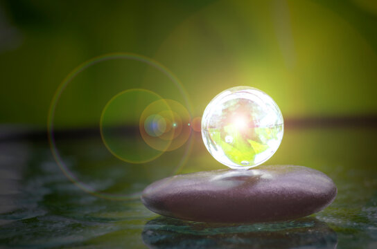 Glowing crystal sphere and zen stones representing clarity and inner harmony, with customizable space for text.