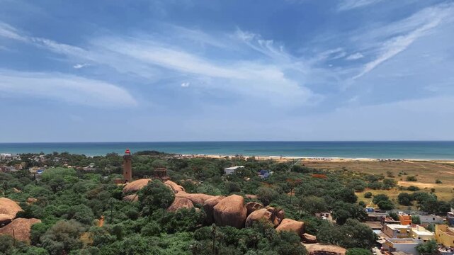Coastal town and greenery beside the lighthouse at Mahabalipuram