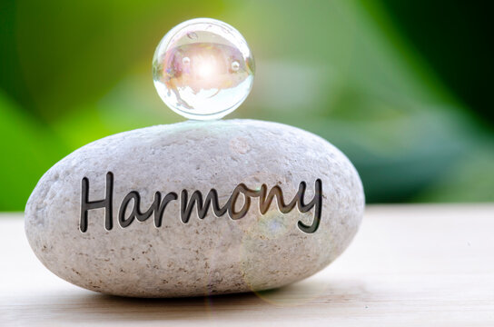 Close up of Zen stone with Harmony text on the stone