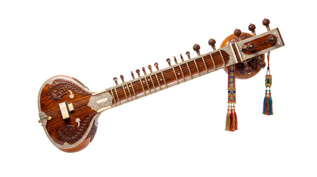 Traditional Indian sitar with intricate wood carvings, classical string instrument with decorative tassels, handcrafted wooden lute isolated PNG with Transparent Background