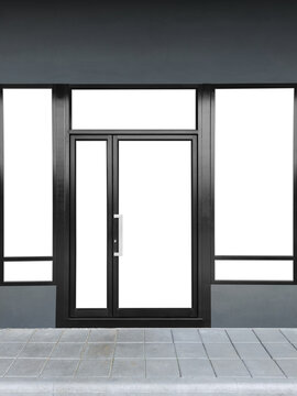 An empty glass door with a black aluminum frame in an office building PNG transparent.