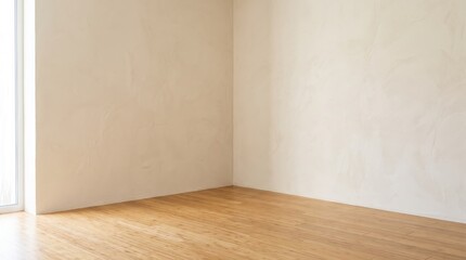Naklejka premium Empty room corner with textured beige walls and light wooden flooring, minimalist interior design, bright natural lighting from window, clean space for renovation, apartment living