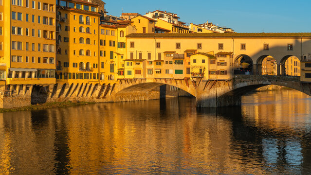 Golden hour light on Ponte Vecchio in Florence Italy