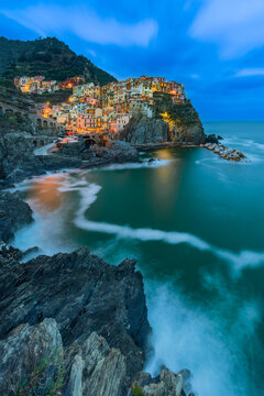 Manarola Cinque Terre coastal village at dusk