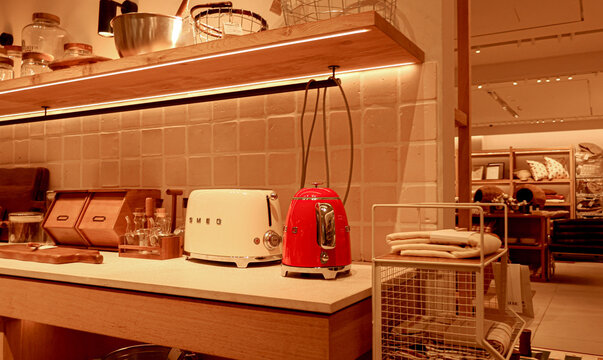 Warsaw, Poland, 20 August 2026. Smeg toaster and kettle displayed with kitchenware and home decor items in a modern store