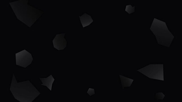Abstract dark grey geometric shards floating slowly on black background