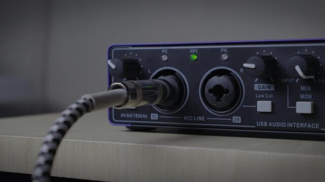 Plugging Instrument Cable into Audio Interface Close-up