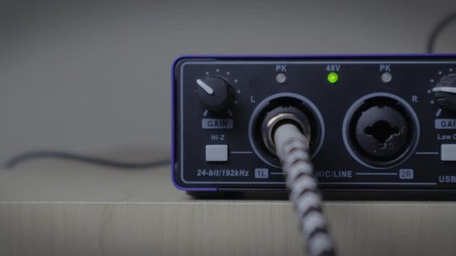 Plugging Instrument Cable into Audio Interface Close-up