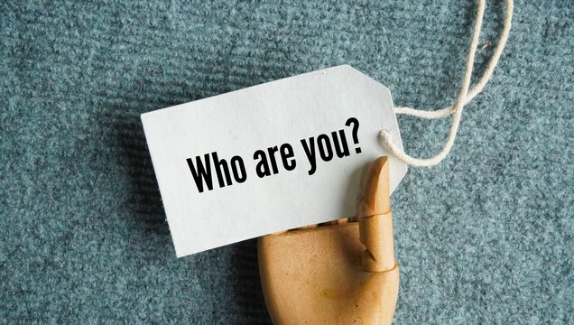 Tag the paper with the question Who are you? direct question used to ask for someone's name, identity, or role.