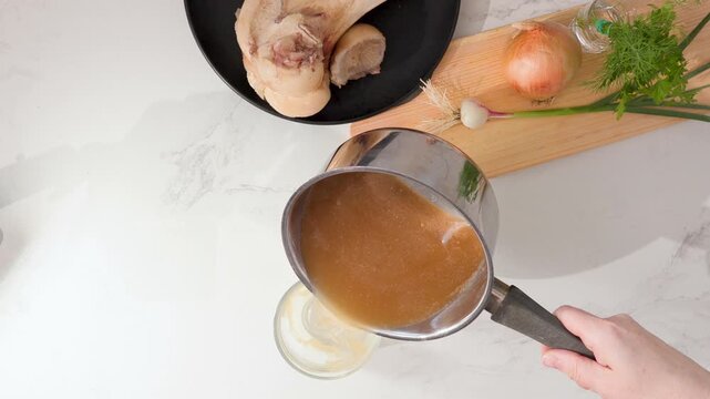 Healthy Bone Broth Beverage in Glass: Nutritious, Ready-to-Drink Wellness