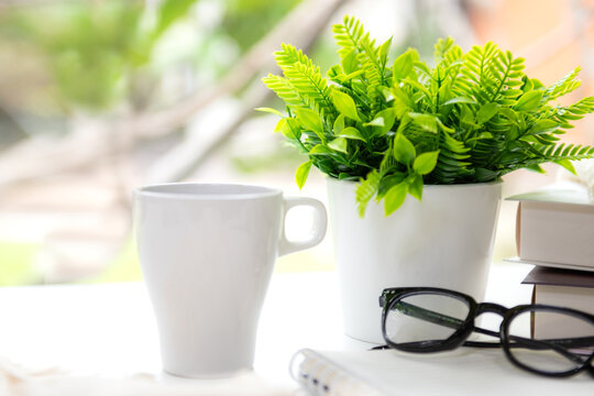 Dream plan notebook with coffee and workspace inspiring personal growth and life goals.  Goal Life Wellness Concept.