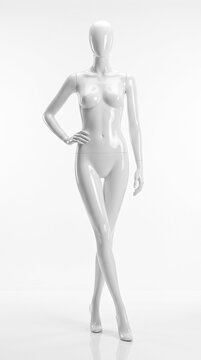 Maniqu&iacute; femenino blanco brillante elegante con pose de mano a la barbilla