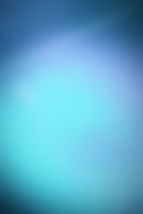 Fototapeta premium Abstract blue and cyan gradient background with grainy texture
