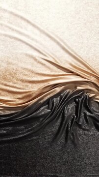 Abstract Background of Flowing Gold and Black Velvet Fabric With Soft Waves