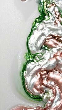Abstract Liquid Motion With Swirling Green and Metallic Rose Gold Pigments in White Fluid