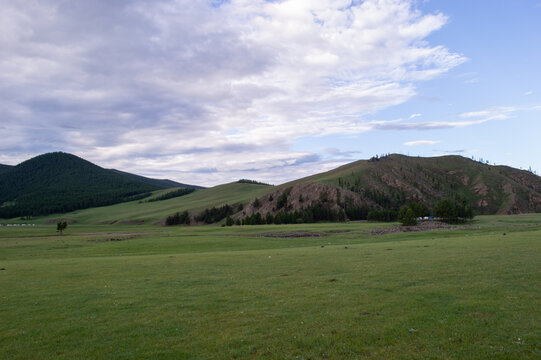 Rolling hills under a cloudy sky, Orkhon Valley, Mongolia
