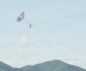 Parasailing over the sea. Da Nang coast. Active leisure. © nadezhda F