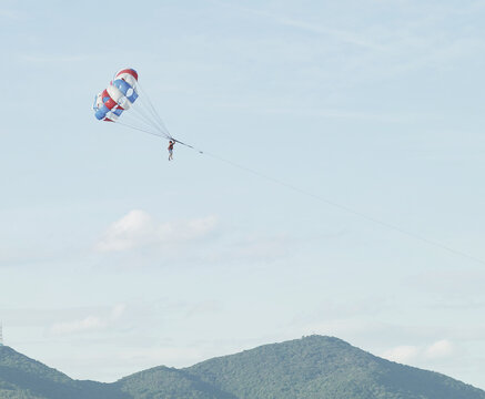 Parasailing over the sea. Da Nang coast. Active leisure.