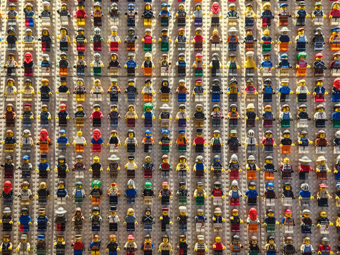 Billund, Denmark. August 17, 2006, LEGO minifigures of various characters and professions arranged in a grid, showcasing a hobby and passion for collecting toys