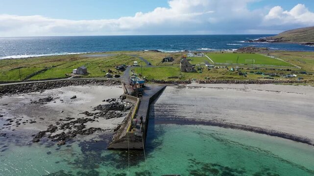 Arranmore, County Donegal, Ireland - April 14 2025 : Ships are repaired next to church ruin at Aerphort